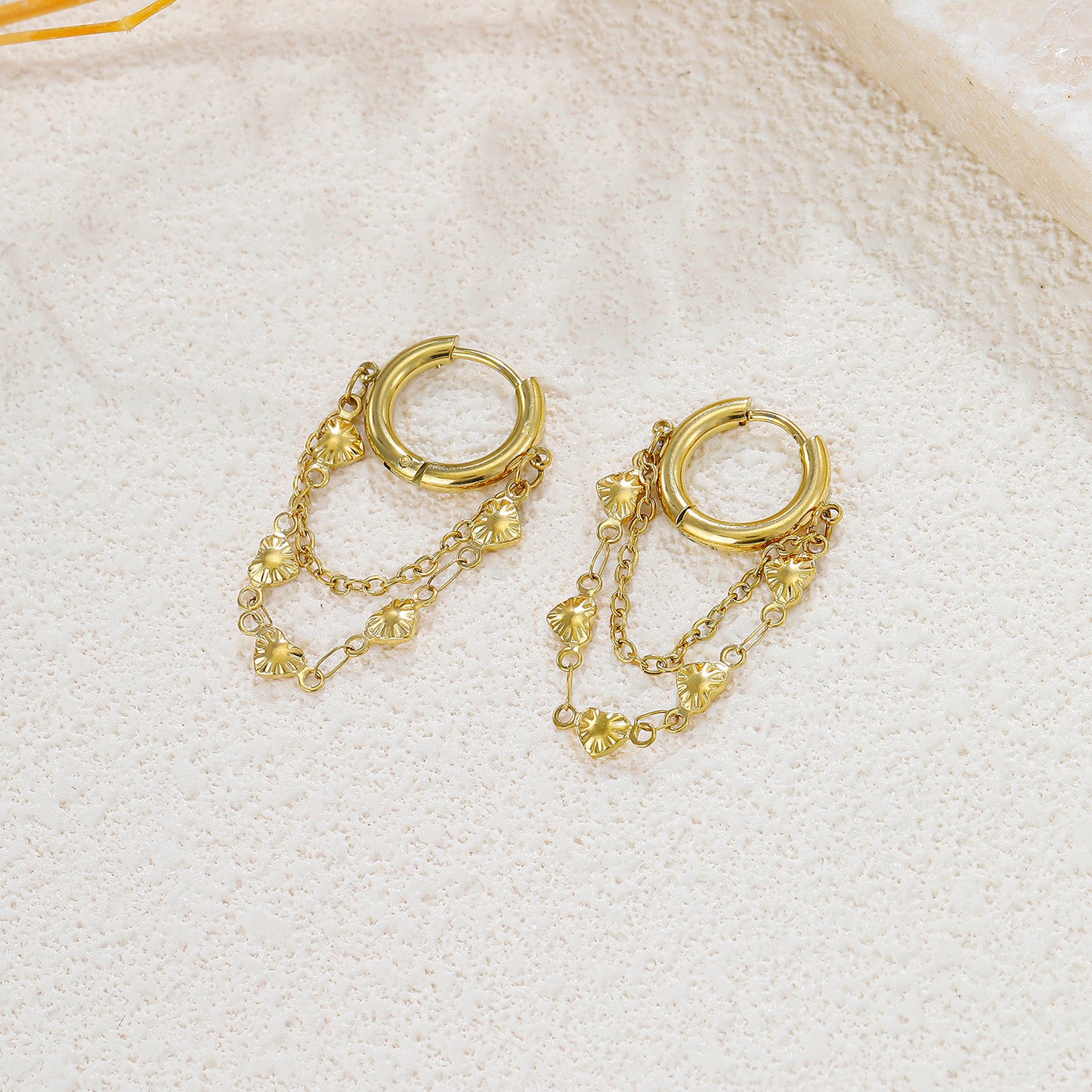 Boucles d'oreilles créoles chaînes cœurs pendants