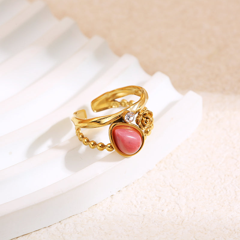 Bague dorée fleur strass et pierre goutte