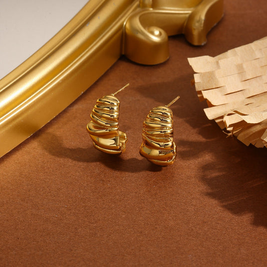 Boucles d'oreilles créoles ouvertes sculptées ondulé