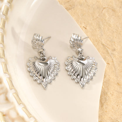 Boucles d'oreilles pendantes cœurs ex-voto texturés