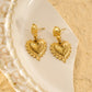 Boucles d'oreilles pendantes cœurs ex-voto texturés