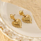 Boucles d'oreilles pendantes cœurs ex-voto texturés