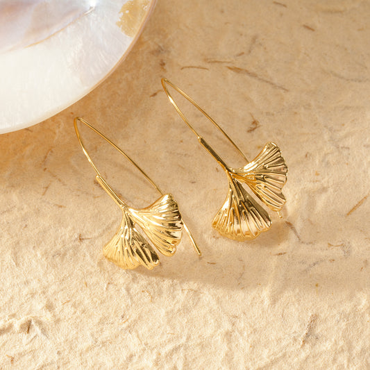 Boucles d'oreilles arc longues dorées feuille de ginkgo