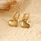 Boucles d'oreilles créoles dorées cœur pendant lisse
