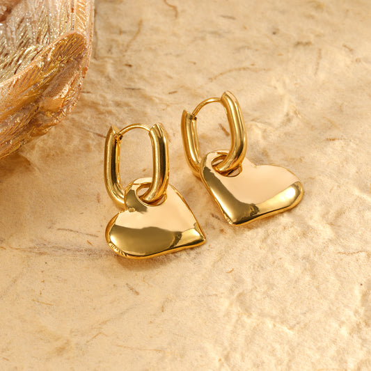 Boucles d'oreilles créoles dorées cœur pendant lisse