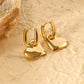 Boucles d'oreilles créoles dorées cœur pendant lisse