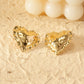 Boucles d'oreilles dorées cœurs bombé texturé