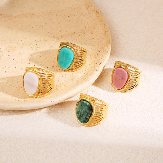 Bague dorée multi ligne serrée pierre