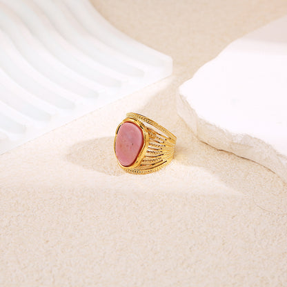 Bague dorée multi ligne serrée pierre