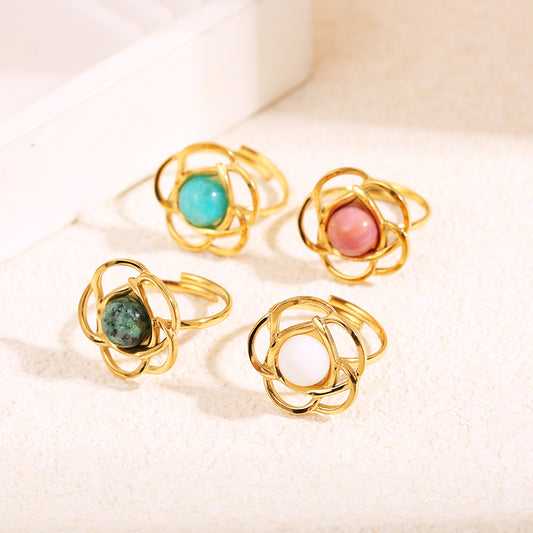 Bague dorée fleur avec pierre interne ronde