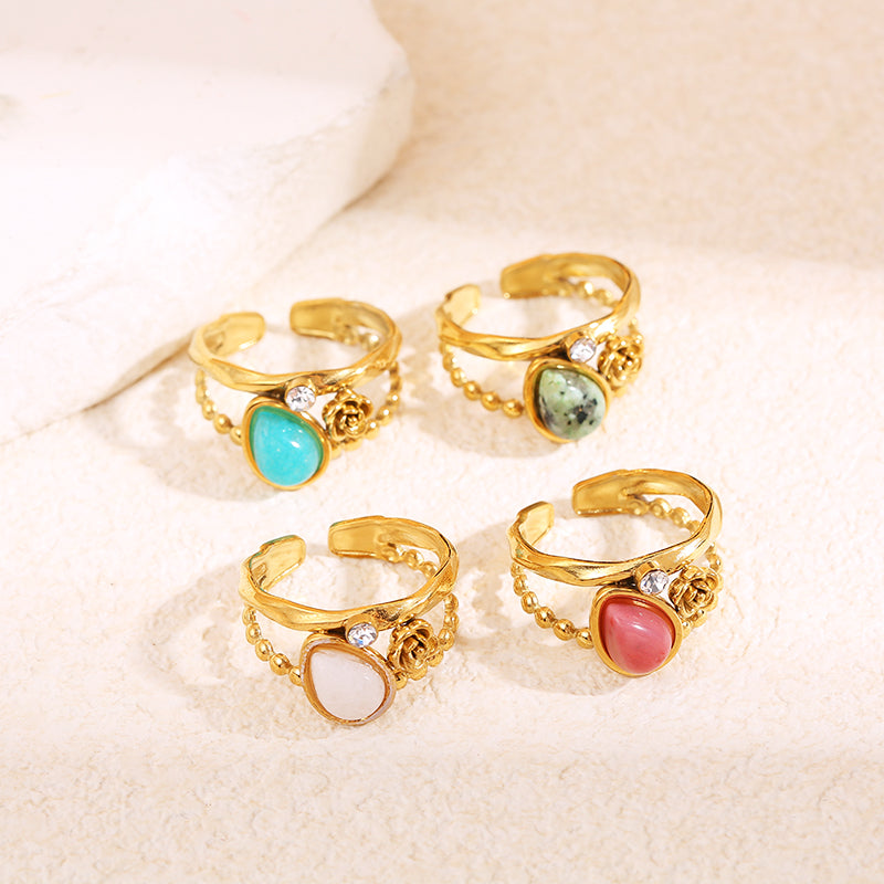 Bague dorée fleur strass et pierre goutte