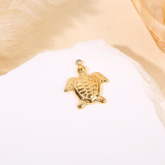 Lot de 3 pendentifs dorés tortues texturées