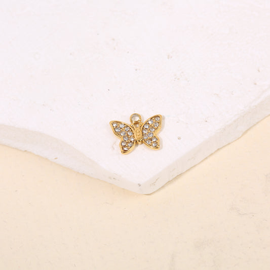 Lot de 3 pendentifs dorés papillons strassés